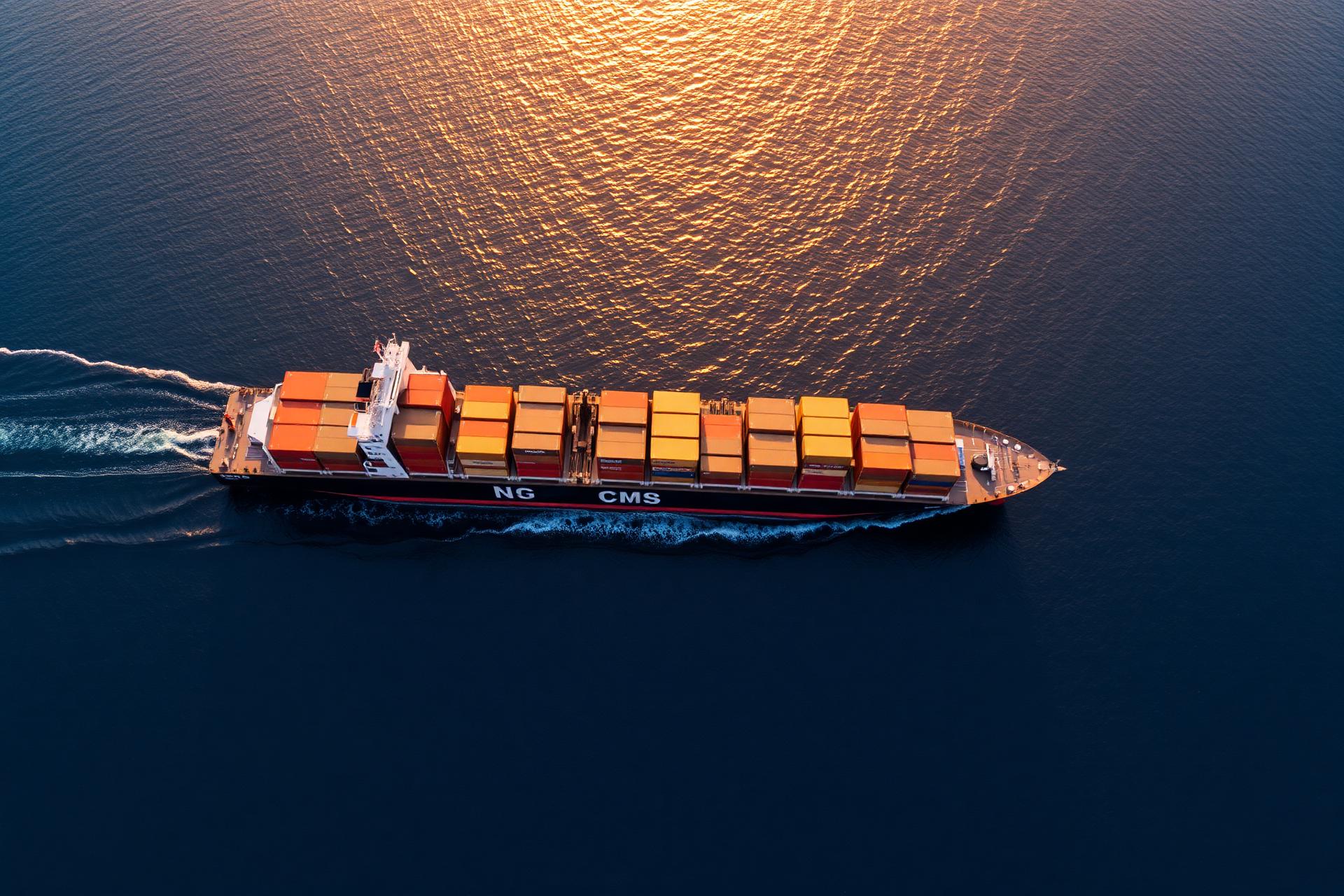 Cargo vessel sailing across the ocean